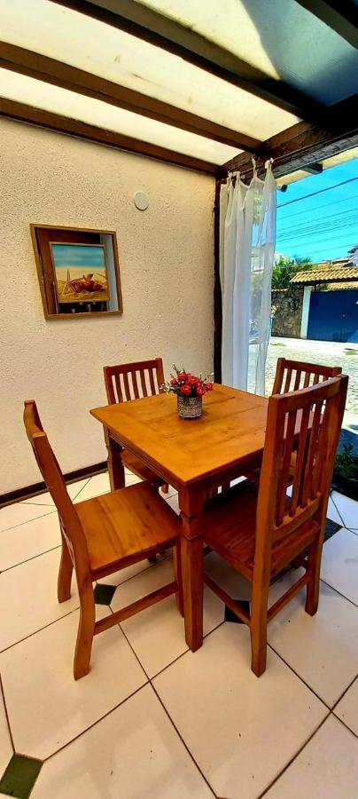 Bliss Hoteis Centro Armacao dos Buzios Bagian luar foto A dining room table with four chairs