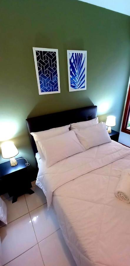 Bliss Hoteis Centro Armacao dos Buzios Bagian luar foto A bed with two pillows